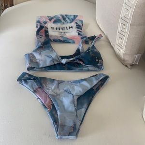 A thing suit never worn also SHEIN